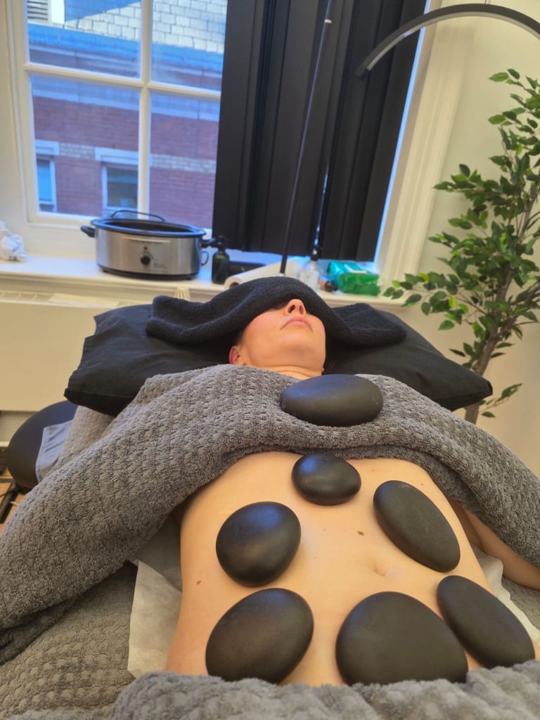 Hot stone therapy at Mayfair Massage & Therapy clinic